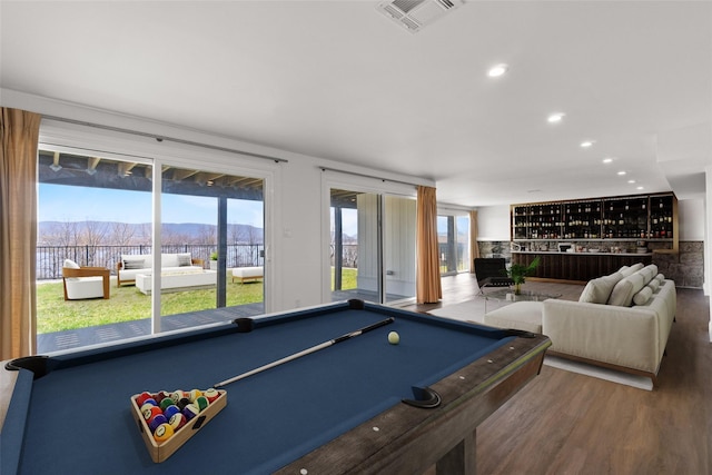 game room featuring wood finished floors, visible vents, billiards, and a mountain view