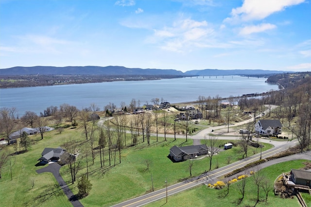 bird's eye view featuring a water and mountain view