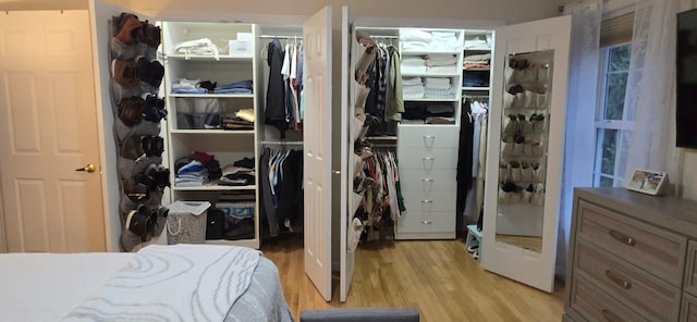 bedroom featuring light wood-style flooring