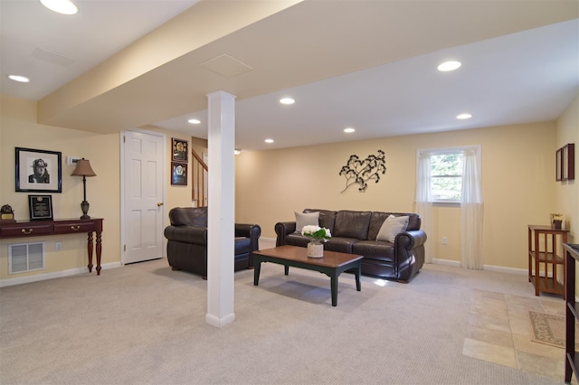 living room featuring visible vents, baseboards, recessed lighting, and light carpet