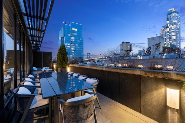 exterior space featuring a view of city and outdoor dining area