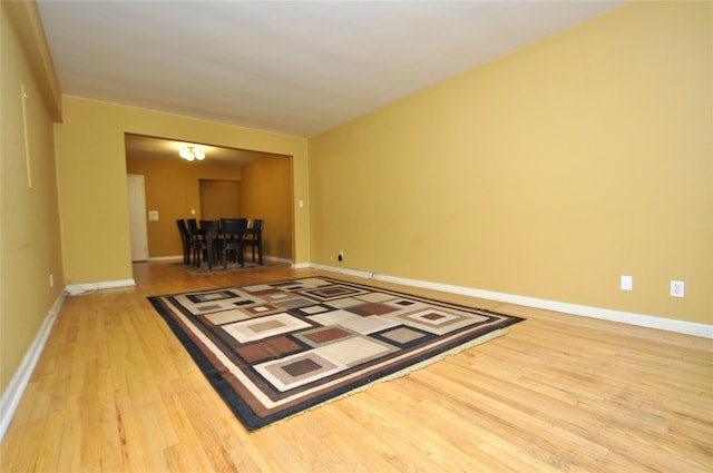 interior space with light wood-type flooring and baseboards