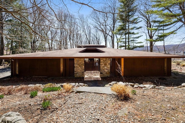 view of front facade with stone siding