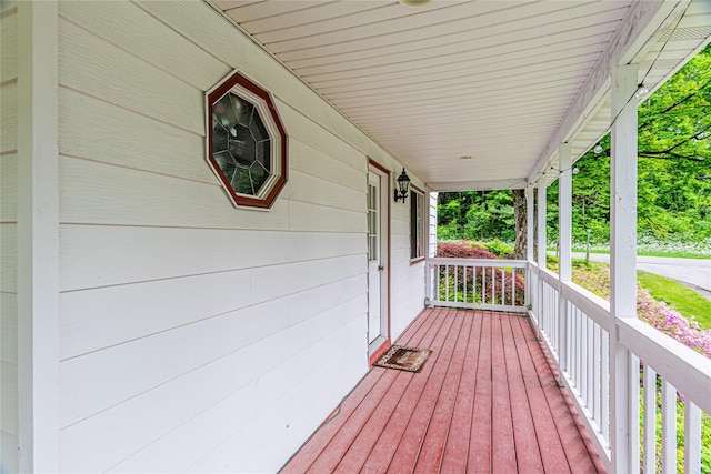 6 Swain Dr, Pleasant Valley, NY 12569 - wooden deck with covered porch