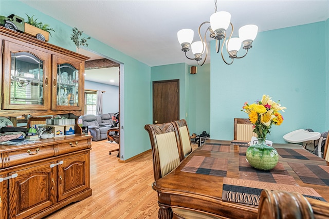6 Swain Dr, Pleasant Valley, NY 12569 - dining space featuring a chandelier and light wood-style floors