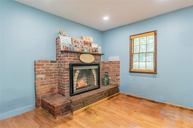 6 Swain Dr, Pleasant Valley, NY 12569 - detailed view of wood finished floors, a brick fireplace, baseboards, and recessed lighting