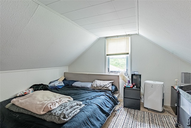 6 Swain Dr, Pleasant Valley, NY 12569 - carpeted bedroom featuring vaulted ceiling and a textured ceiling