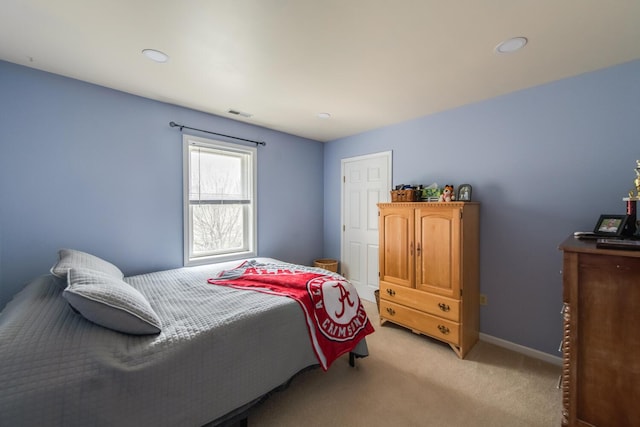 bedroom with recessed lighting, baseboards, light colored carpet, and visible vents