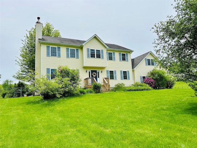 848 Rte 216, Poughquag, NY 12570 - colonial house featuring a chimney and a front lawn