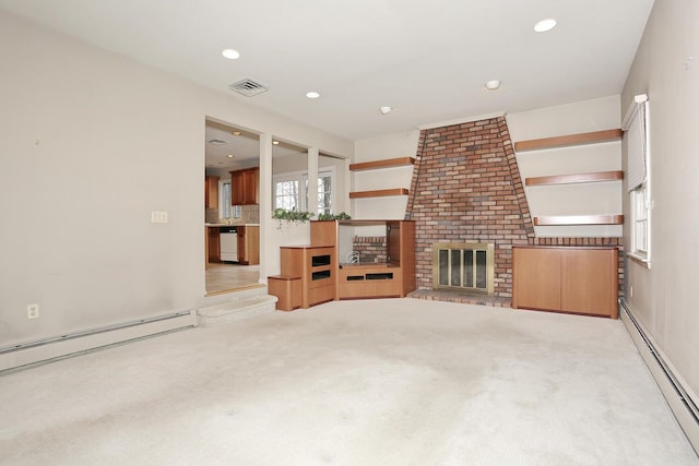unfurnished living room with visible vents, baseboard heating, and light colored carpet