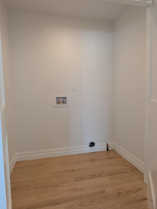 1135 Logan Rd, Wantagh, NY 11793 - laundry area featuring hookup for a washing machine and light wood-style floors