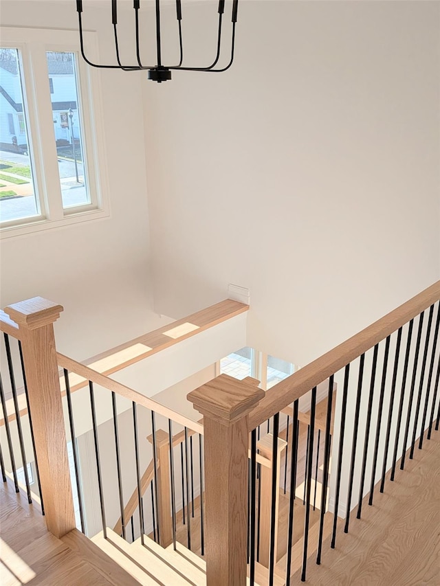 1135 Logan Rd, Wantagh, NY 11793 - stairway featuring wood finished floors
