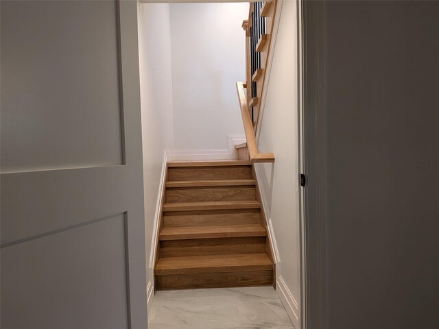 1135 Logan Rd, Wantagh, NY 11793 - stairs with marble finish floors and baseboards