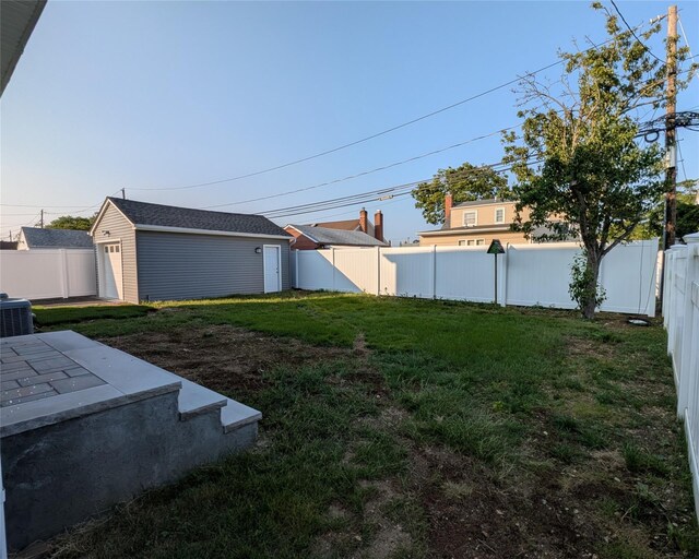 1135 Logan Rd, Wantagh, NY 11793 - fenced backyard featuring an outbuilding