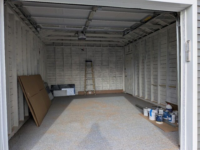 1135 Logan Rd, Wantagh, NY 11793 - garage featuring a garage door opener