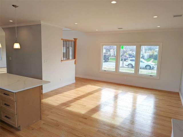 1135 Logan Rd, Wantagh, NY 11793 - unfurnished living room with light wood-type flooring, baseboards, crown molding, and recessed lighting