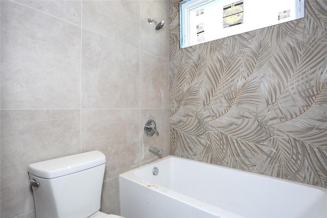 full bath featuring toilet and shower / washtub combination