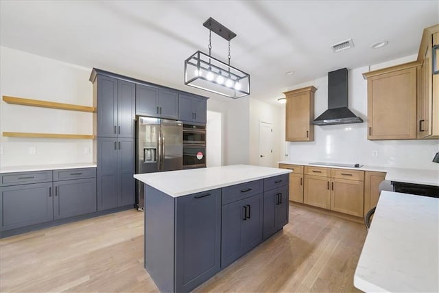 kitchen with light wood-type flooring, a center island, open shelves, wall chimney exhaust hood, and stainless steel appliances
