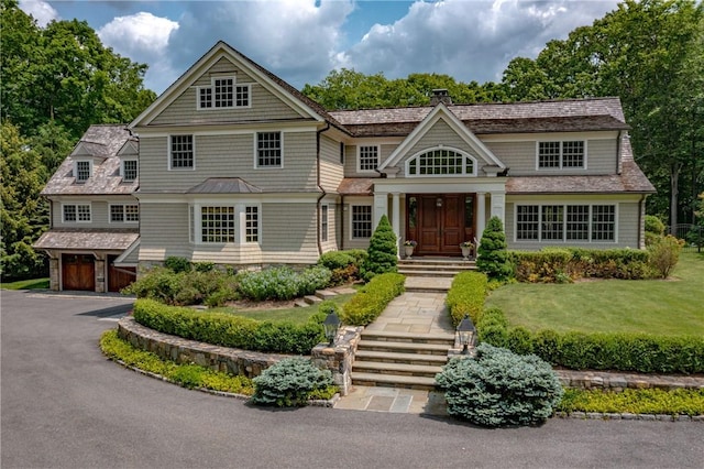 70 Haights Cross Rd, Chappaqua, NY 10514 - shingle-style home featuring a chimney and asphalt driveway