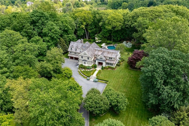 70 Haights Cross Rd, Chappaqua, NY 10514 - aerial view of property and surrounding area featuring a heavily wooded area