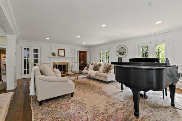 70 Haights Cross Rd, Chappaqua, NY 10514 - living room featuring french doors, ornamental molding, recessed lighting, wood finished floors, and a fireplace