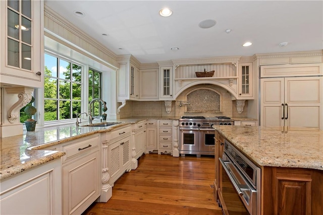 70 Haights Cross Rd, Chappaqua, NY 10514 - kitchen with stainless steel appliances, a sink, cream cabinetry, and recessed lighting