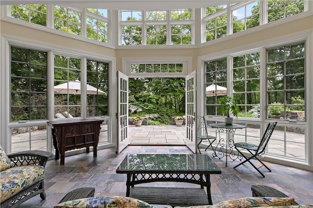70 Haights Cross Rd, Chappaqua, NY 10514 - sunroom with stone tile floors and a high ceiling
