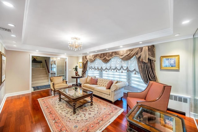 34 Duke Dr, Manhasset Hills, NY 11040 - living area featuring a raised ceiling, radiator heating unit, visible vents, and stairs