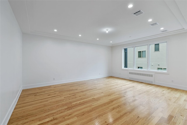 5 Francis Pl Unit 214, Monsey, NY 10952 - unfurnished room with radiator, light wood finished floors, and recessed lighting