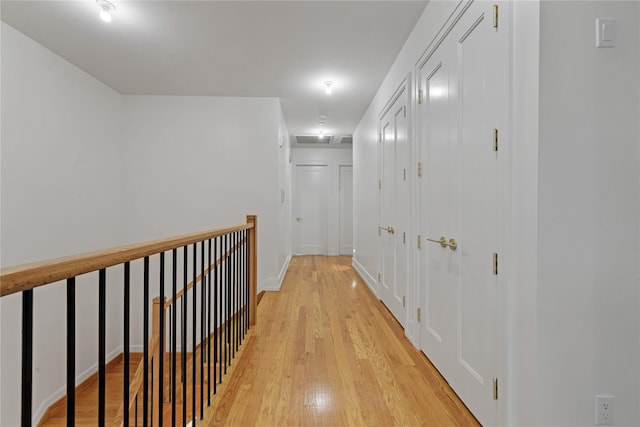 5 Francis Pl Unit 214, Monsey, NY 10952 - hall with an upstairs landing and light wood finished floors