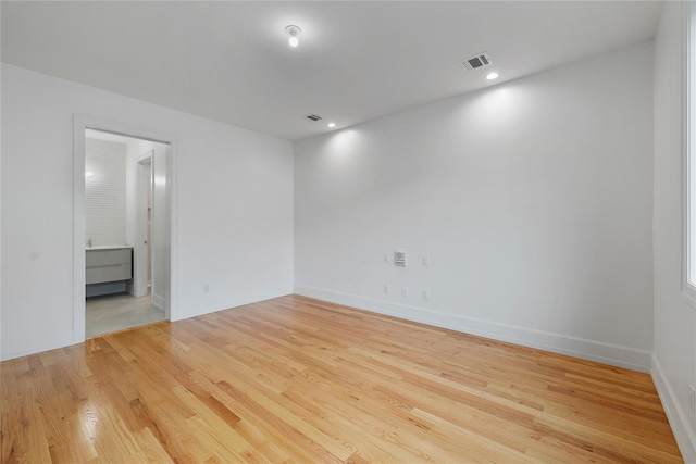 5 Francis Pl Unit 214, Monsey, NY 10952 - spare room featuring wood finished floors and recessed lighting