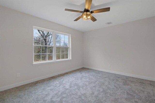 LOT2 Lakes Rd, Monroe, NY 10950 - carpeted empty room with visible vents, baseboards, and ceiling fan