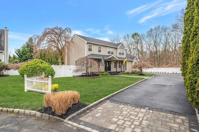 6 Premier Ct, Port Jefferson Station, NY 11776 - view of front of property with a front yard, fence, and aphalt driveway
