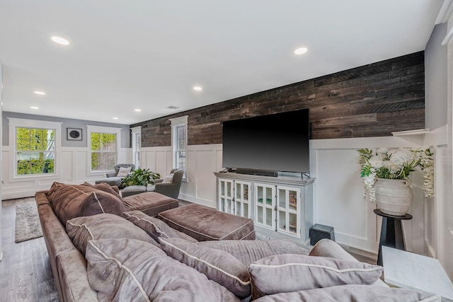 6 Premier Ct, Port Jefferson Station, NY 11776 - living area with wood finished floors, wainscoting, and recessed lighting