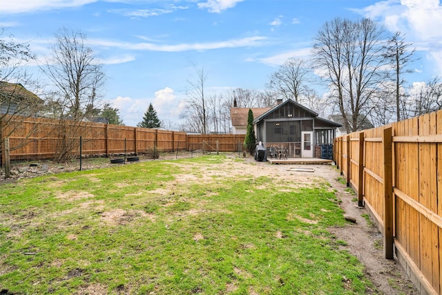 view of yard featuring a fenced backyard