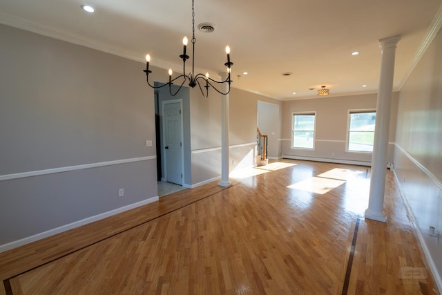 107 Denniston Dr, New Windsor, NY 12553 - unfurnished room featuring crown molding, a baseboard radiator, light wood-type flooring, baseboards, and a chandelier
