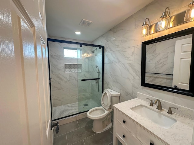 107 Denniston Dr, New Windsor, NY 12553 - full bathroom featuring tile walls, a stall shower, toilet, vanity, and recessed lighting