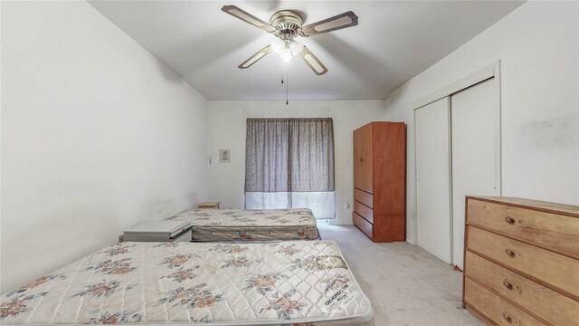 111-09 62nd Dr, Forest Hills, NY 11375 - bedroom featuring light carpet, a closet, and a ceiling fan