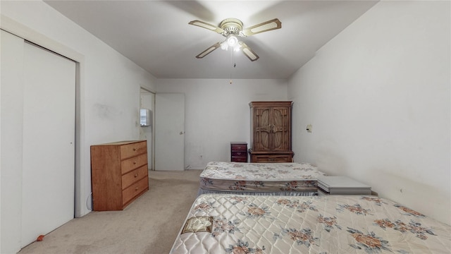 111-09 62nd Dr, Forest Hills, NY 11375 - bedroom featuring a closet, ceiling fan, and light carpet