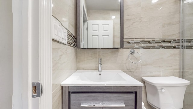 111-09 62nd Dr, Forest Hills, NY 11375 - bathroom with toilet, tasteful backsplash, vanity, and tile walls