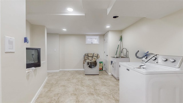 111-09 62nd Dr, Forest Hills, NY 11375 - laundry area featuring baseboards, a sink, washing machine and dryer, and recessed lighting