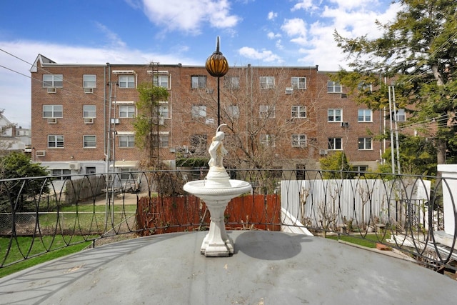 view of patio / terrace with fence