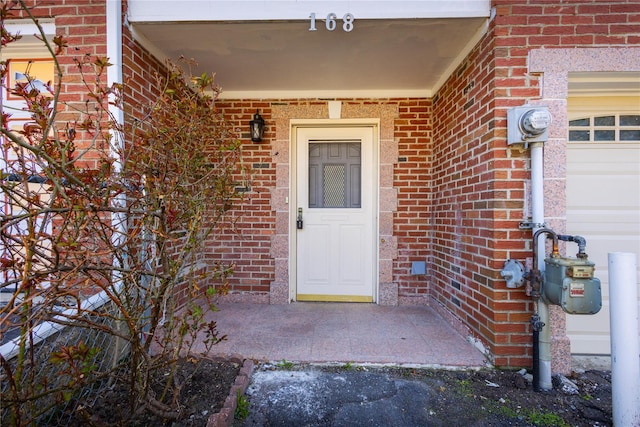 168 Vails Gate Heights Dr, New Windsor, NY 12553 - doorway to property with brick siding