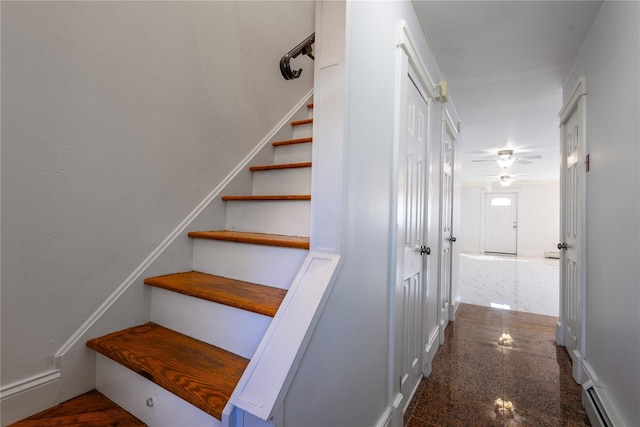 168 Vails Gate Heights Dr, New Windsor, NY 12553 - stairs with granite finish floor, a ceiling fan, and baseboard heating