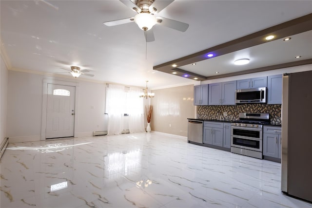 168 Vails Gate Heights Dr, New Windsor, NY 12553 - kitchen with ceiling fan with notable chandelier, stainless steel appliances, baseboards, and backsplash