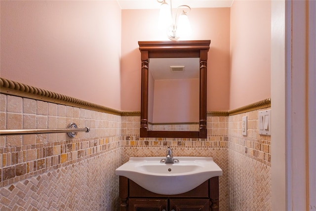 168 Vails Gate Heights Dr, New Windsor, NY 12553 - bathroom featuring tile walls, visible vents, and vanity