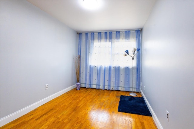 168 Vails Gate Heights Dr, New Windsor, NY 12553 - empty room with light wood-style flooring and baseboards