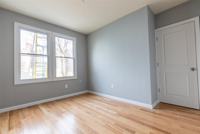 5933 48th Ave, Woodside, NY 11377 - unfurnished room featuring light wood-style flooring and baseboards