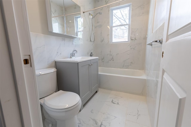 5933 48th Ave, Woodside, NY 11377 - bathroom featuring tile walls, toilet, vanity, and washtub / shower combination