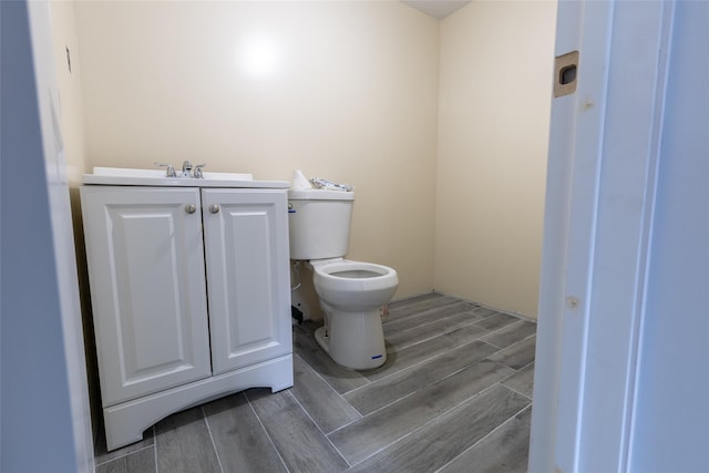 5933 48th Ave, Woodside, NY 11377 - bathroom featuring toilet and wood finish floors